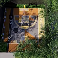 Garden Landscape Design With Geometric Paving Water Feature And Green Plants