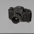 Vintage Electronic Camera With Silver Metal Body Lens And Buttons On Dark Background With Reflection