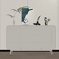 Modern White Entryway Cabinet Sideboard With Green Plant Painting Clock And Decorative Figurine