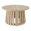 Round Light Colored Wooden Dining Table With Natural Wood Texture And Slatted Support Structure