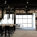 Modern Public Office Space With Open Layout Desk Chairs And Natural Light