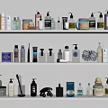 Various Perfume And Cosmetic Products Displayed On White Shelves With Different Containers