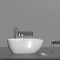 White Freestanding Bathtub In Modern Bathroom With Gray Wall Black Shelf And Side Table