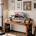 Wooden Office Desk With Mountain View Monitor Desk Lamp Potted Plant And Decorative Wall Art