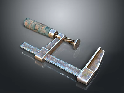 Vintage Brass Clamp Tool With Textured Handle On Black Reflective Surface 3d model