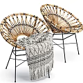 Stylish Rattan Leisure Chairs With Black Metal Legs Gray Geometric Pattern Blanket And Fringe Detail