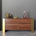 Striped Wooden Console Cabinet With Gold Legs Drawers And Decorative Vases On Gray Floor