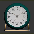 Green Circular Decorative Mirror With Gold Metal Stand And Reflective Surface