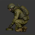 EOD Soldier In Military Uniform Kneeling To Defuse Explosive Device With Tactical Gear
