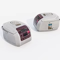 Two Modern Digital Rice Cookers With Stainless Steel Body For Home Kitchen Use