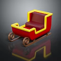 Red And Yellow Decorative Sleigh With Brown Curved Wheels And Red Seat