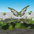 Stunning Butterfly Sculpture Photo Spot With Green Plants Flowers And Sunset Sky