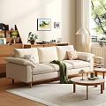 Casual Beige Sofa Set with Decorative Pillows Green Throw Blanket and Wooden Coffee Tables