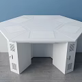 Octagonal White Office Desk With Three Laptops Displaying Windows Interface Drawers And Ventilation Holes