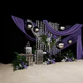 Elegant Floral Display with Purple Curtains Hanging Silver Spheres and Event Decor Setup