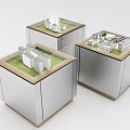 Display Shelves With Transparent Cube Design Green Lawn Top And Small Building Models