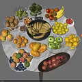 Colorful Assorted Fresh Fruits in Glass Bowls and Plates on Marble Table