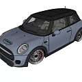 Shiny Black Sporty Compact Car With Alloy Wheels And Front Grille Design