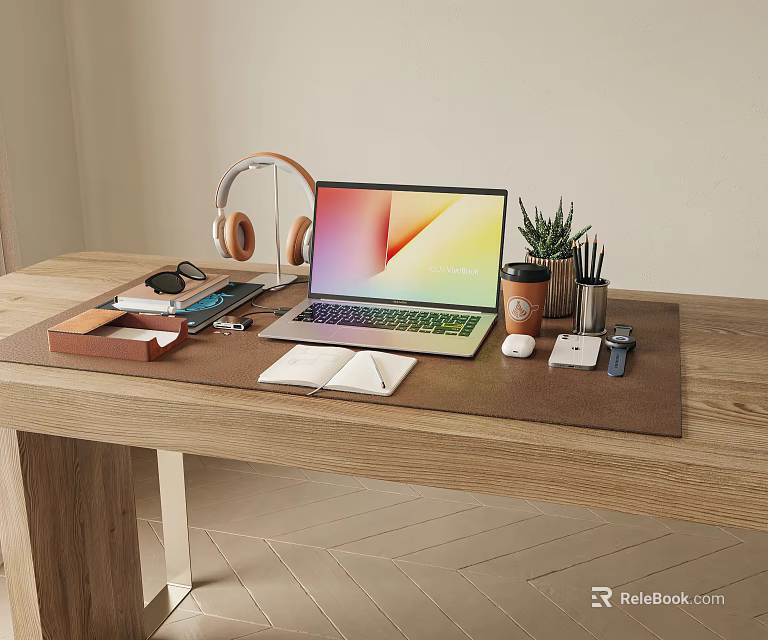 Laptop Setup on Wooden Desk With Headphones Potted Plant Stationery Notebook and Mouse Pad 3d model 