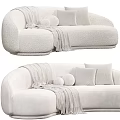 Modern Cream Sectional Sofa With Soft Throw Blanket And Round Decorative Pillows