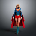 Blonde Superhero Woman In Blue Top Red Shorts And Red Cape With Superman Logo