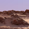 Majestic Desert Landscape With Rugged Rock Formations Sandy Terrain And Lavender Sky