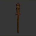 Brown Wooden Stick With Red Strap Tied Around Middle Section