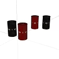 Four Black And Red Oil Drums With Oil Labels On White Surface