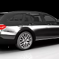 Black Mercedes Station Wagon With Sleek Exterior And Silver Alloy Wheels