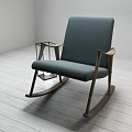 Deep Blue Upholstered Rocking Chair with Wooden Frame and Modern Minimalist Design