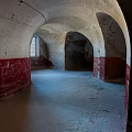 Indoor Arched Interior With Red Brick Walls Graffiti And Natural Light
