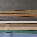 Dining Table Featuring Colorful Leather Strips in Various Shades and Neat Arrangement