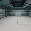 Spacious Industrial Warehouse Interior Featuring Metal Frames Glass Roof Gray Walls And Concrete Floor