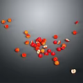 Red And Orange Small Fruits Scattered On Black Background With Sliced Ones Showing Seeds