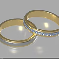 Two Elegant Gold Matching Rings With Blue Gemstones And Smooth Design