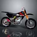 Black Motocross Motorcycle With Red And White Rebel Details Orange Fork And Silver Engine
