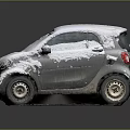 Snow Covered Silver Small Car With Gray Background And Shiny Wheels 3d model