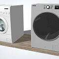 White Front Load Washing Machine And Dryer In Home Laundry Space