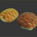 Two Freshly Baked Artisan Bread Loaves With Golden And Red Crusty Surface Patterns