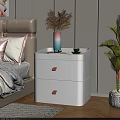 Modern White Bedside Table With Drawers And Vase Cup In Bedroom Interior