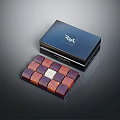 Colorful Chocolate Pieces Neatly Arranged In Black Box With Elegant Design And Attractive Presentation