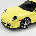 Yellow Sports Car in Side View with Black Windows Silver Wheels and Red Brake Calipers