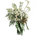 Elegant Floral and Greenery Decorative Arrangement with White Flowers Large Tropical Leaves and Brown Spikes