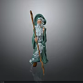 Elderly Man in Green Robe with Long Beard Holding Wooden Staff Against Dark Background