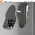 Modern Irregular Shaped Mirrors With Black Toy Figure And AWS Sign In Interior Decor