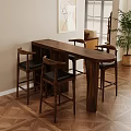 Modern Interior Featuring Wooden Bar Counter High Stools Fruit Bowl And Flowers