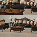 Classic Leather Sofa And Wooden Coffee Table Set With Carved Details Accent Pillows And Lamps