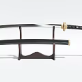 Traditional Samurai Sword With Black Scabbard And Gold Accents On Wooden Stand