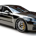 Modern Black Sedan With Sleek Design Sporty Wheels And Yellow Brake Calipers