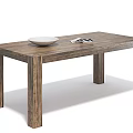 Natural Wooden Dining Table with White Plate and Magazines on Top